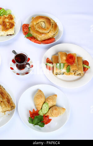 Homemade rolled borek, pastry, Turkish patty with tea Stock Photo