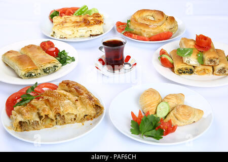 Homemade rolled borek, pastry, Turkish patty with tea Stock Photo