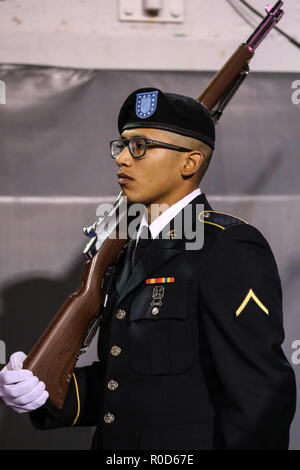 Las Vegas, NV, USA. 3rd Nov, 2018. PV2 Cesar Montalvo prepares for the presentation of the colors prior to the start of the NCAA football game featuring the Fresno State Bulldogs and the UNLV Rebels at Sam Boyd Stadium in Las Vegas, NV. Christopher Trim/CSM/Alamy Live News Stock Photo