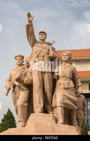 Statue representing the Communist People in front of the Mausoleum of Mao in Tienanmen Square, Beijing Stock Photo