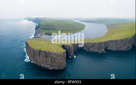 Lake Leitisvatn (Sorvagsvatn) on cliffs above the ocean, Vagar island, Faroe Islands, Denmark, Europe Stock Photo