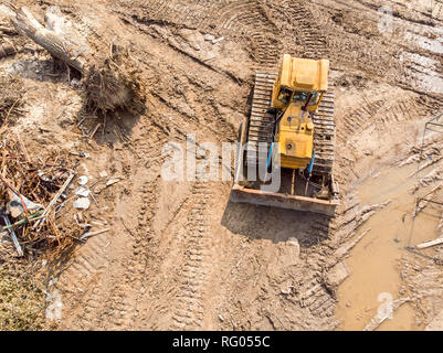 destruction of old building. bulldozer working on a demolition site Stock Photo