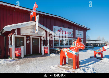 Mora, Sweden. 02/15/2017. The Dala Horse Factories of Nusnäs of carved Dalecarlian Horse. Where Sweden’s most famous souvenir is being made. Stock Photo