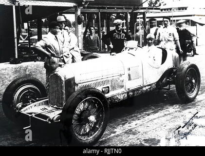 A photograph of Tazio Nuvolari in an Alfa Romeo. Tazio Nuvolari (1892-1953) an Italian racing driver. Dated 20th century Stock Photo