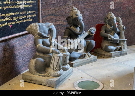 Sculptures of Ganesh Playing Musical Instruments, Sri Senpaga Vinayagar Hindu Ganesh Temple, Joo Chiat District, Singapore. Stock Photo