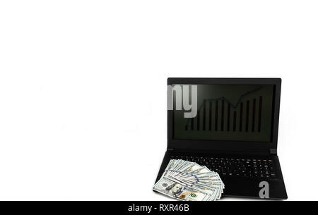 Laptop or notebook with widespread of dollar cash money isolated on white background with clean blank display template mock up Stock Photo