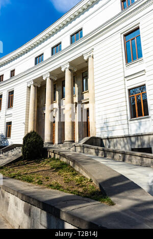 White building of State Georgian University in Tbilisi downtown Stock Photo