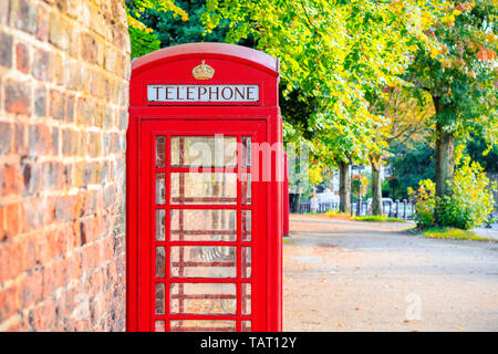 Traditional red telephone box on street of Hampstead Heath in London Stock Photo