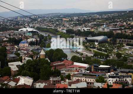 View of Tbilisi and the Peace Brigde. Capital of Georgia Stock Photo