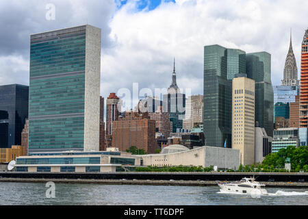 New York, USA,  14 June 2019. Buildings of New York City's Manhattan including the United Nations headquarters (L), the Empire State building (C) and Stock Photo