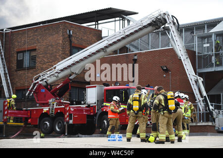 Fire fighters at the scene of a fire at Walthamstow Mall on Selbourne Road, Walthamstow, east London. London Fire Brigade (LFB) have declared a major incident as more than 100 firefighters tackle a blaze at the east London shopping centre. Stock Photo