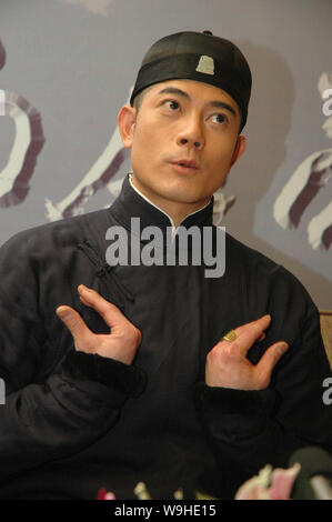 Hong Kong star Aaron Kwok clad in traditional Chinese outfit arrives for a news conference of his latest movie in Beijing, February 5, 2007 Stock Photo