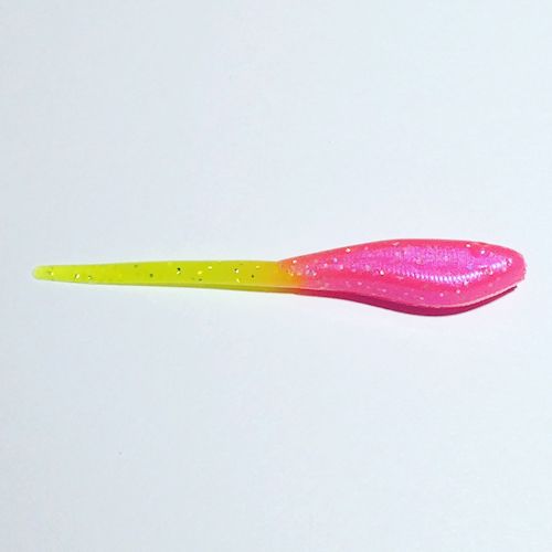 A pink and yellow plastic spoon on top of a table.