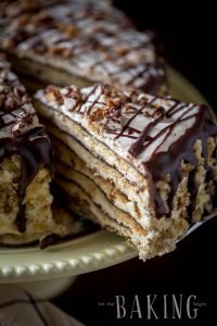 Holiday Cake - Shortbread Cake layers lined topped with plum butter, walnuts, meringue, and Custard Buttercream | by Let the Baking Begin!