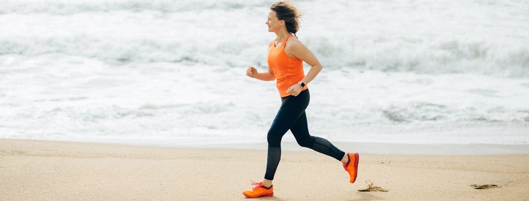 a women running on the beach