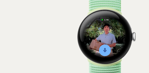 The screen of the Google Pixel Watch 3 displaying a Nest Camera feed of a person outside of a front door.