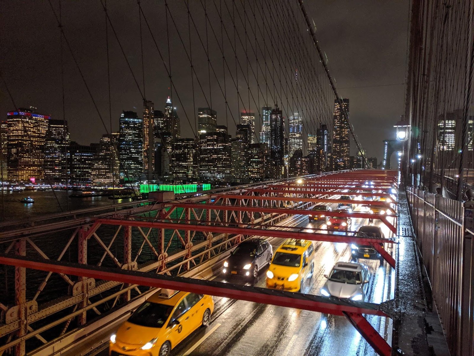 Brooklyn Bridge With Taxis And Traffic