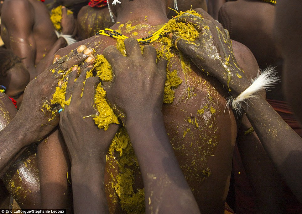 Initiation rite: Boys of the Turkana tribe aren't considered men until they have killed an animal with a single spear throw, after which dung is smeared over their bodies