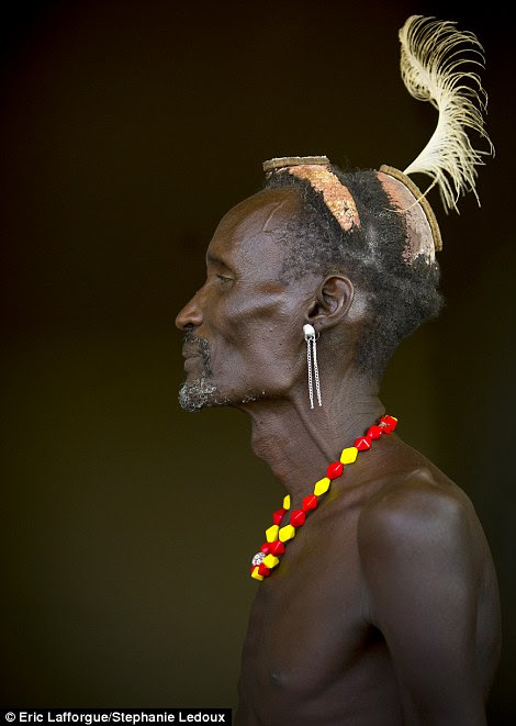 Elaborate: A man shows off his emedot hairdo