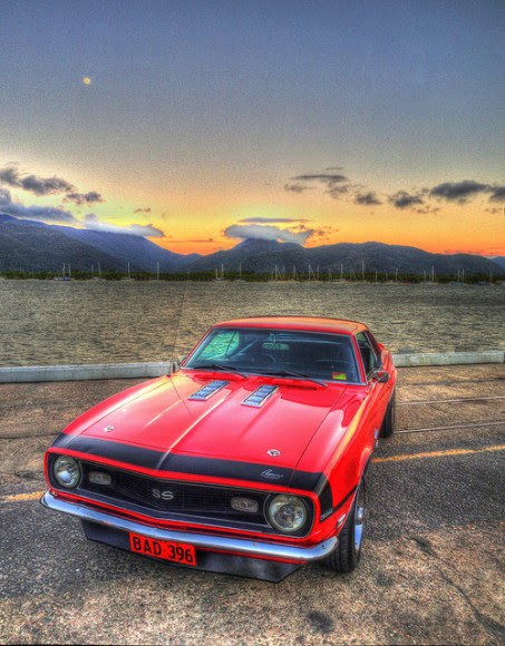 Camaro and Full Moon - Aug 9, 2014. Taken from the Cairns Wharf in Australia at dusk using an iPhone 5. Three frames; two exposures each. Credit and copyright: Joseph Brimacombe.  