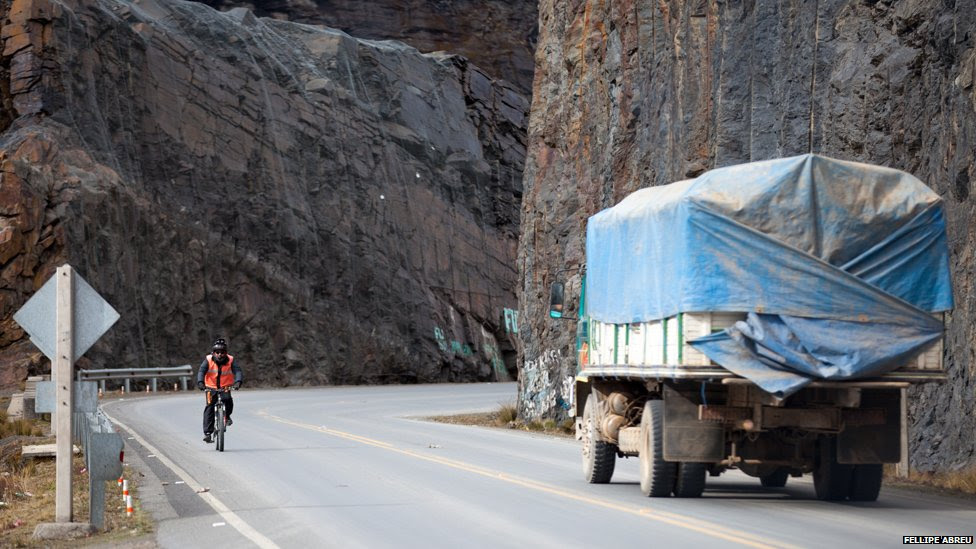 A lorry and a cyclist on the Yungas road on 6 September, 2014