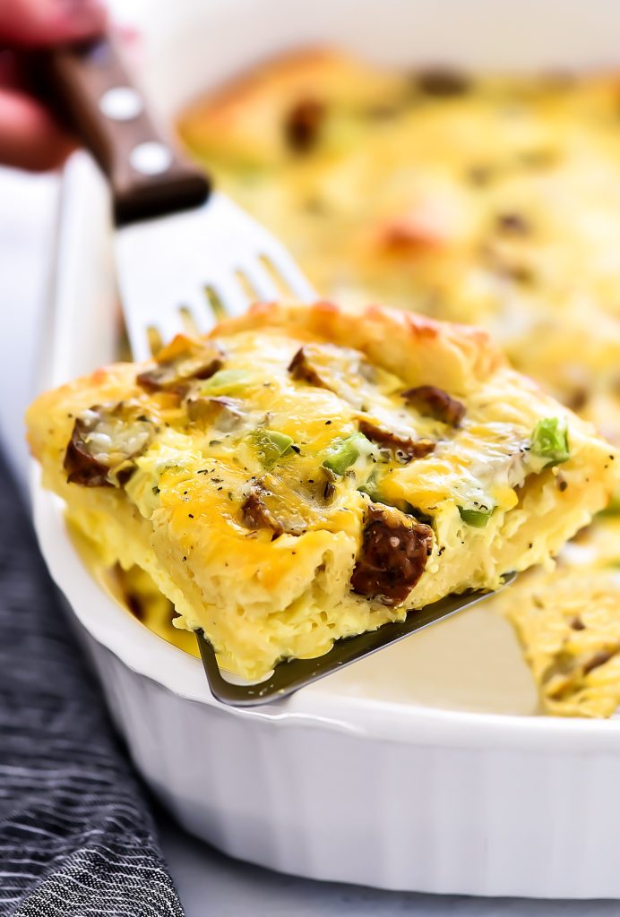 Breakfast Bake is filled with a delicious egg mixture, sausage and green bell peppers over a crescent crust. Life-in-the-Lofthouse.com