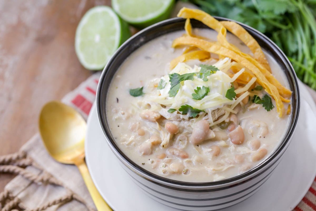 White chili recipe with chicken served in a bowl.