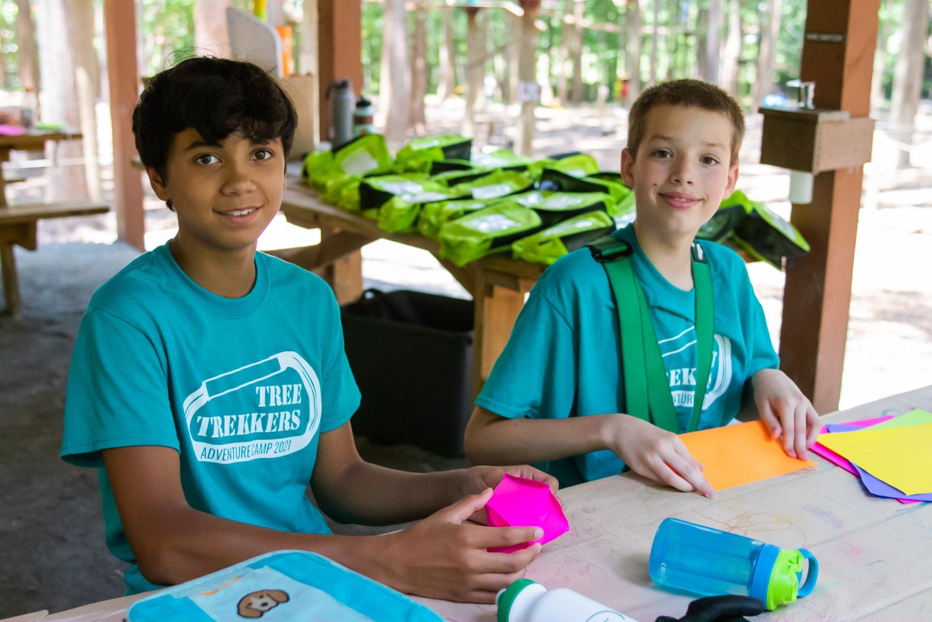 Campers doing crafts in picnic pavilion