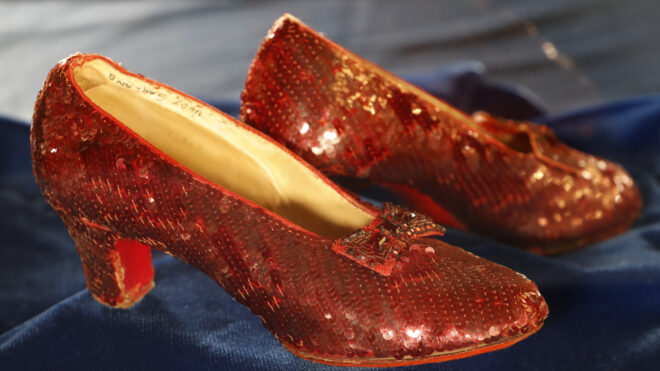 Judy Garland's ruby slippers were recovered 13 years after they went missing from the Judy Garland Museum in Grand Rapids, Minnesota. A bidder paid $28 million for the storied pair of ruby slippers worn by actor Judy Garland and featured prominently in the classic film “The Wizard of Oz,” during Heritage Auctions’ live event Saturday, Dec. 7, 2024, in Dallas.(Richard Tsong-Taatarii/Minneapolis Star Tribune/TNS)