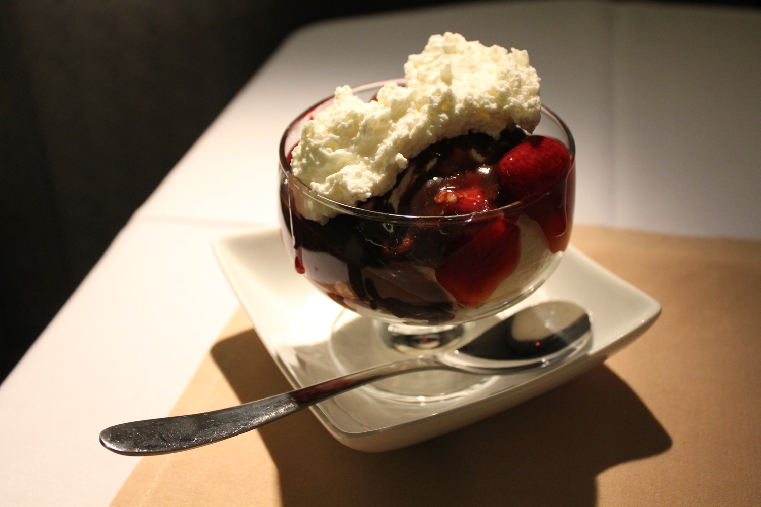 a dessert in a bowl with a spoon