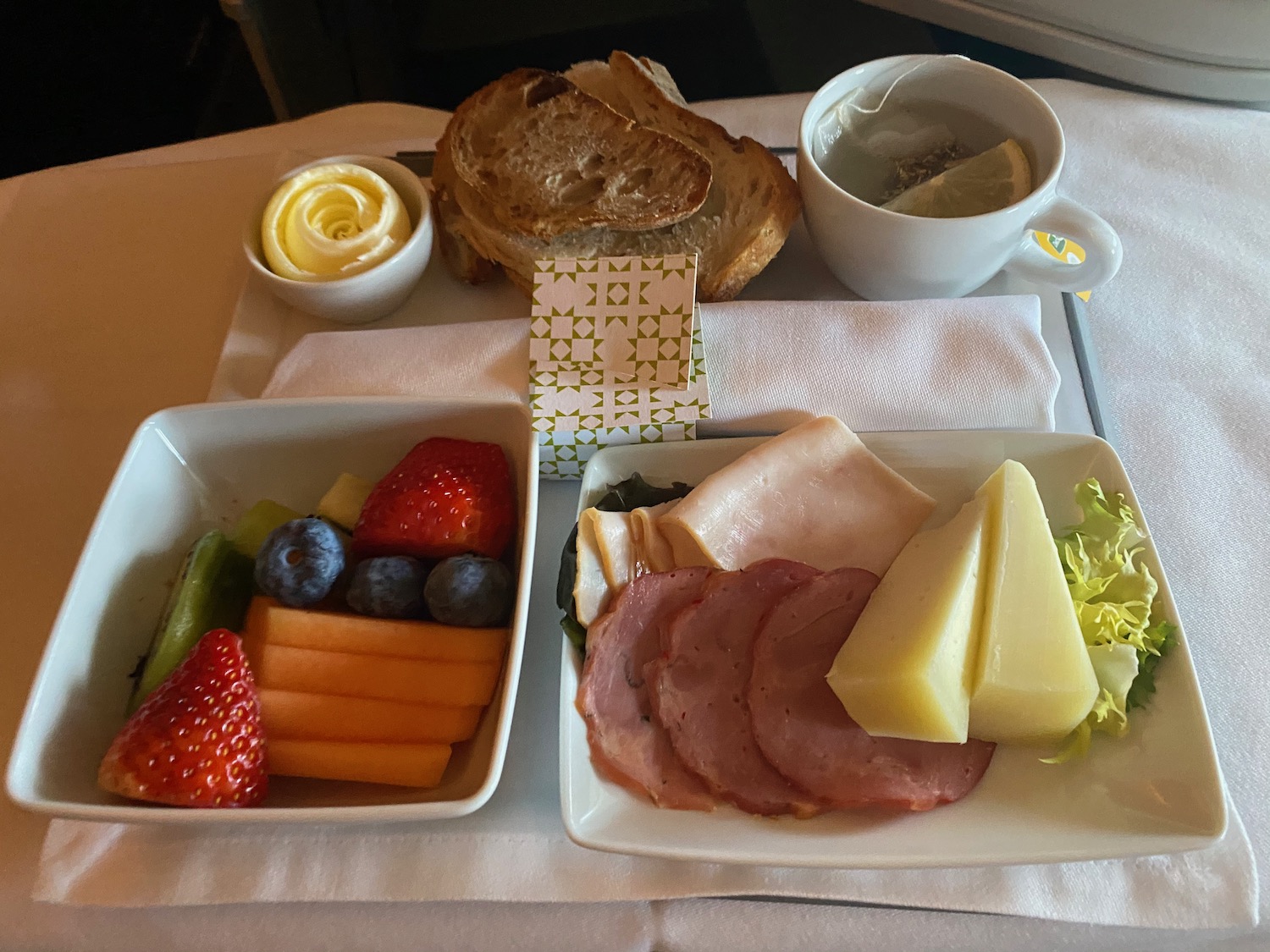 a plate of food and a cup of tea