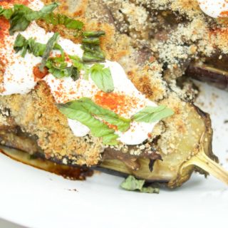 This tasty Eggplant Stuffed with Mushrooms recipe is super easy to make and the perfect vegetarian entree for the summer. Topped with a savory crust.