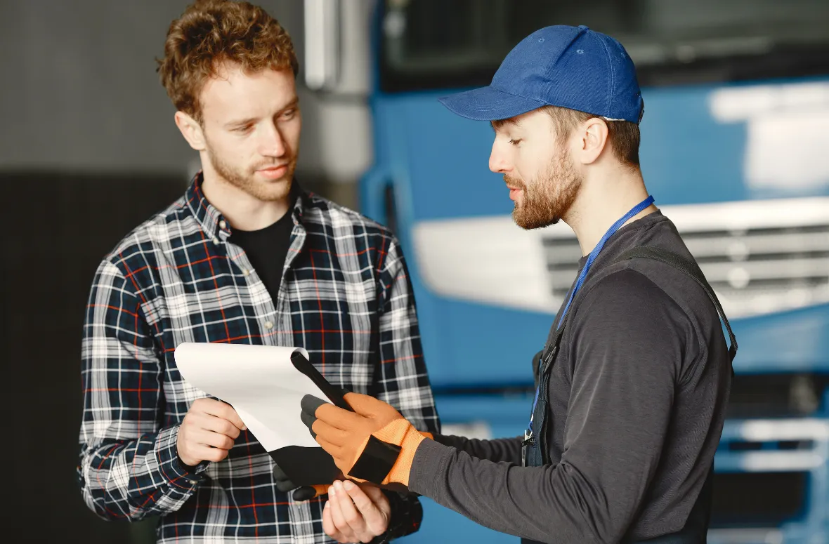 Logistics professionals discussing shipment plans