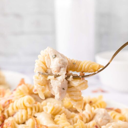 chicken bacon ranch casserole on plate with fork.