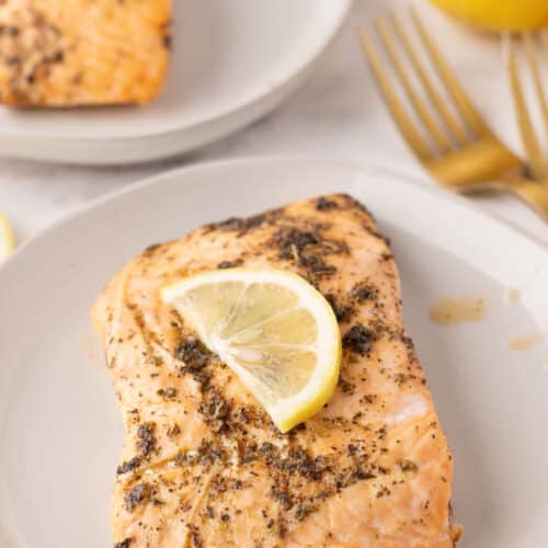 baked salmon on white plate.