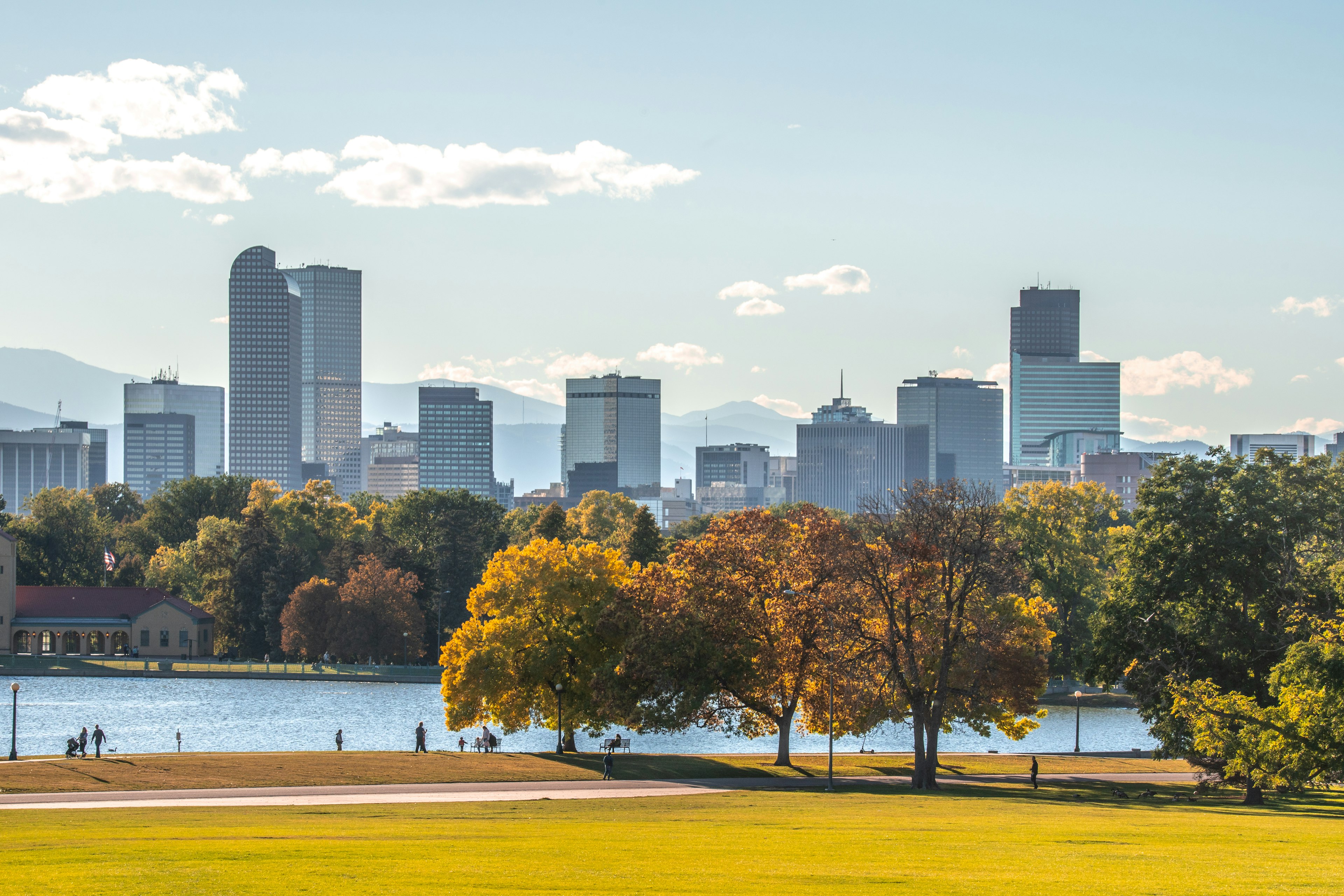 Autumn Trees And Buildings In City Against Sky