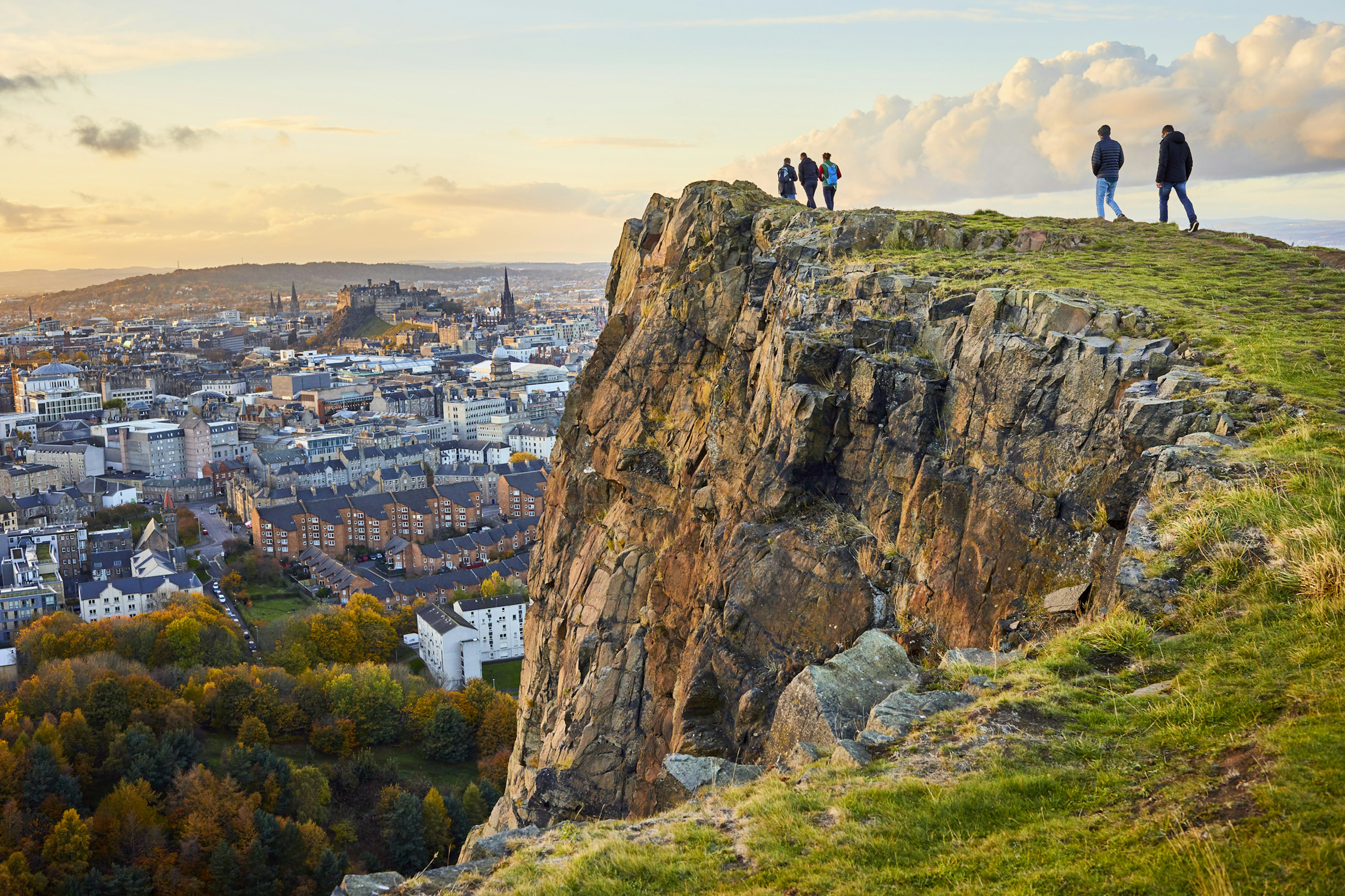 Salisbury Crags, Holyrood Park with Edinburgh city the in background at sunset