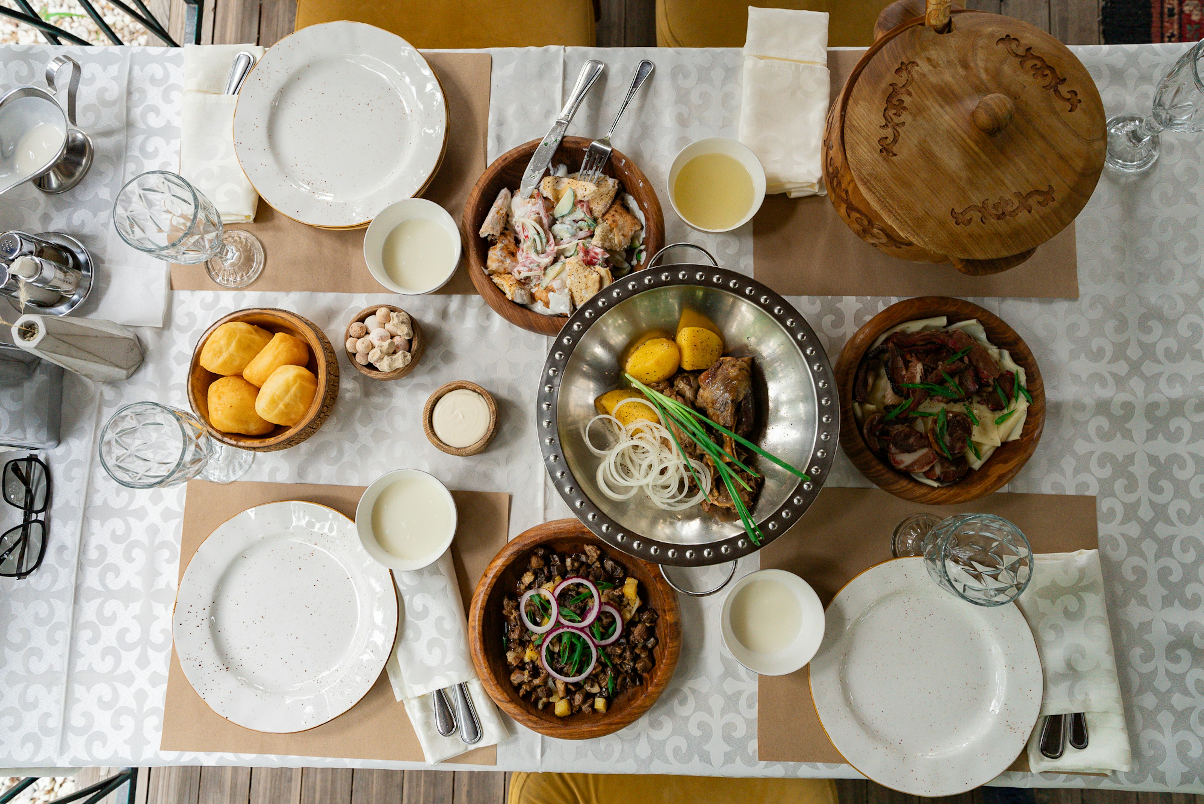 A table set with traditional Kazakh dishes at Qaimaq Restaurant, top-down view, Almaty, National Restaurant Qaimaq, Kazakhstan