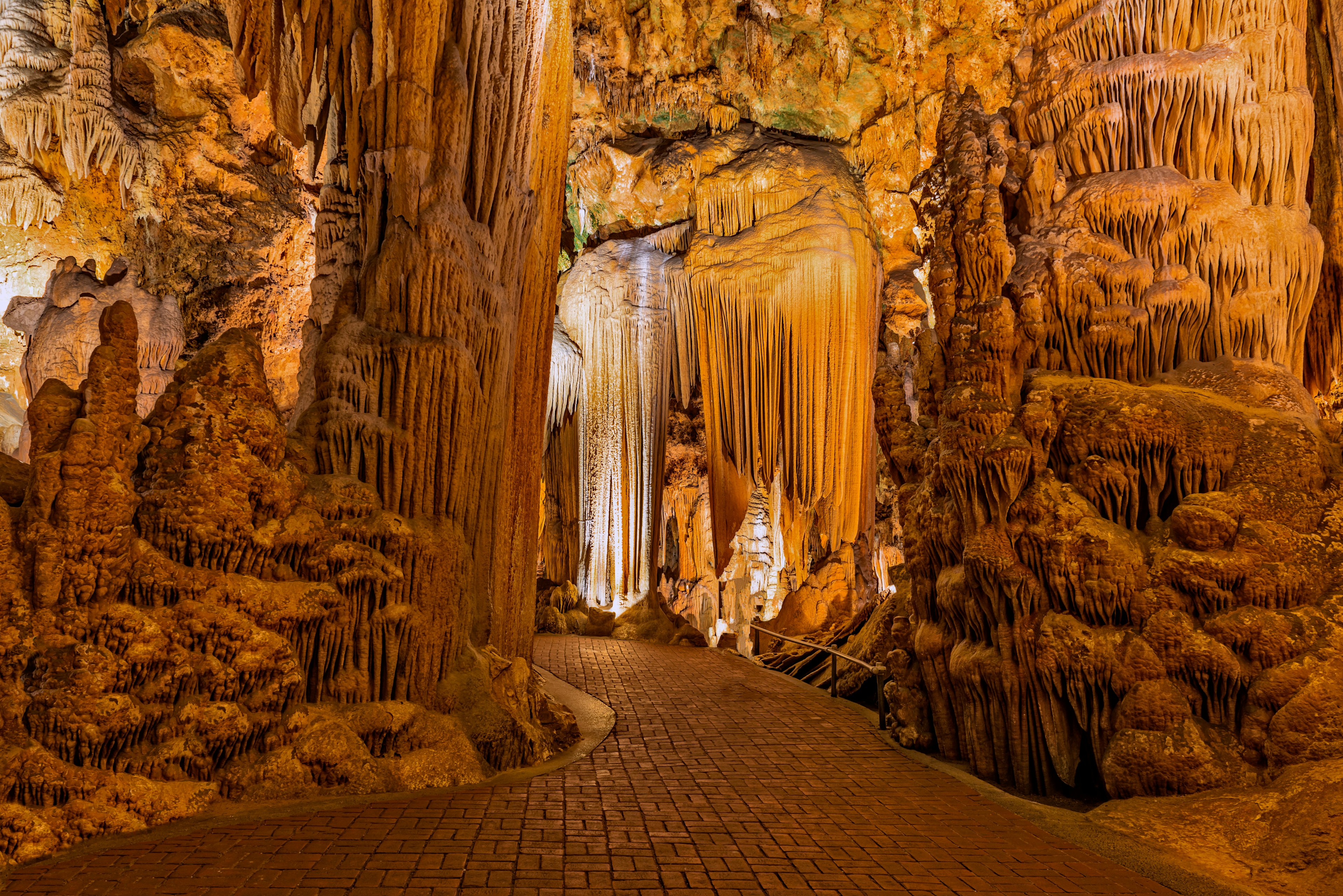 A cave packed with intricate stalactites and stalagmite formations