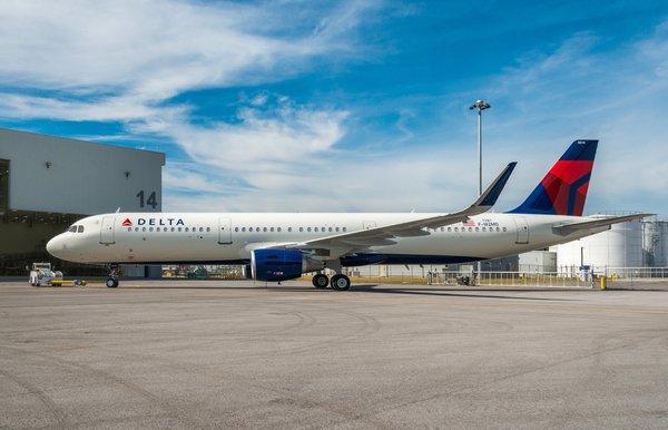 A Delta airbus on the runway.