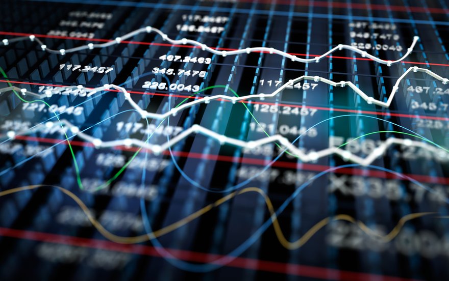 Stock charts showing volatility.