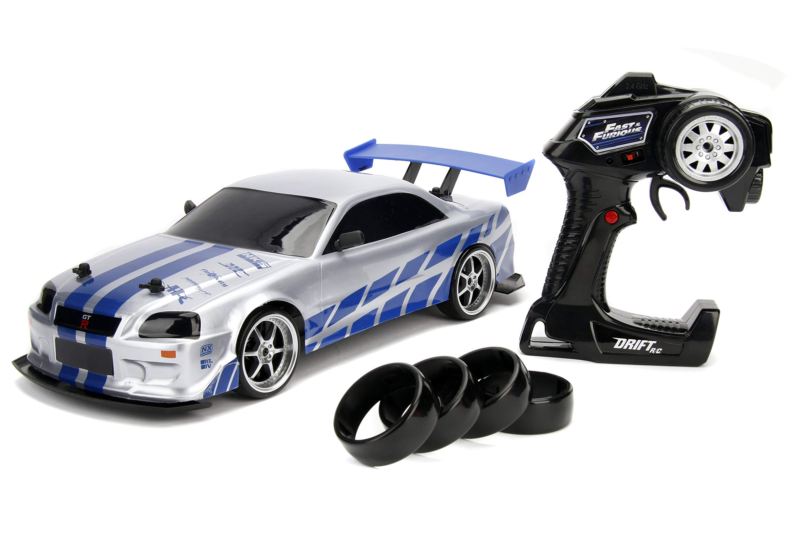 Photo 1 of Jada Toys Fast & Furious Brian's Nissan Skyline GT-R (BN34) Drift Power Slide RC Radio Remote Control Toy Race Car with Extra Tires, 1:10 Scale, Silver/Blue (99701)