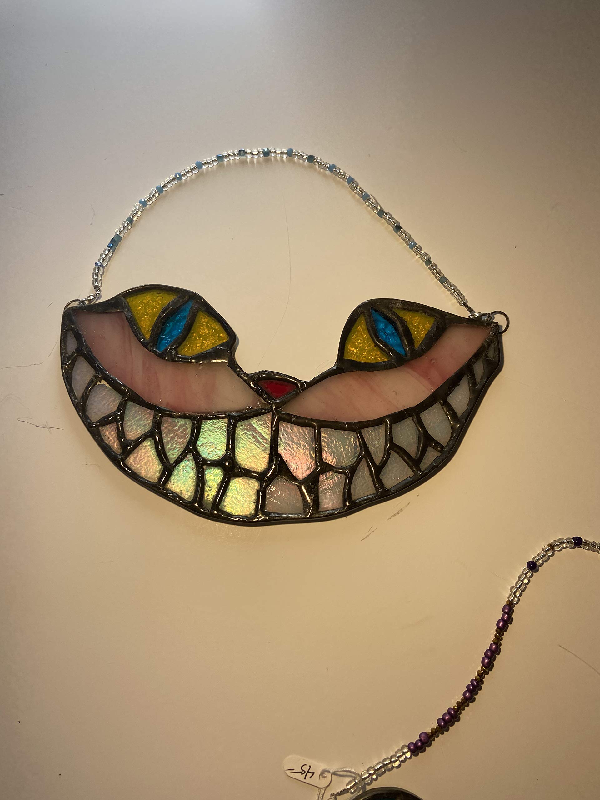 Cheshire Cat Smile Stained Glass pink w yellow and aqua eyes