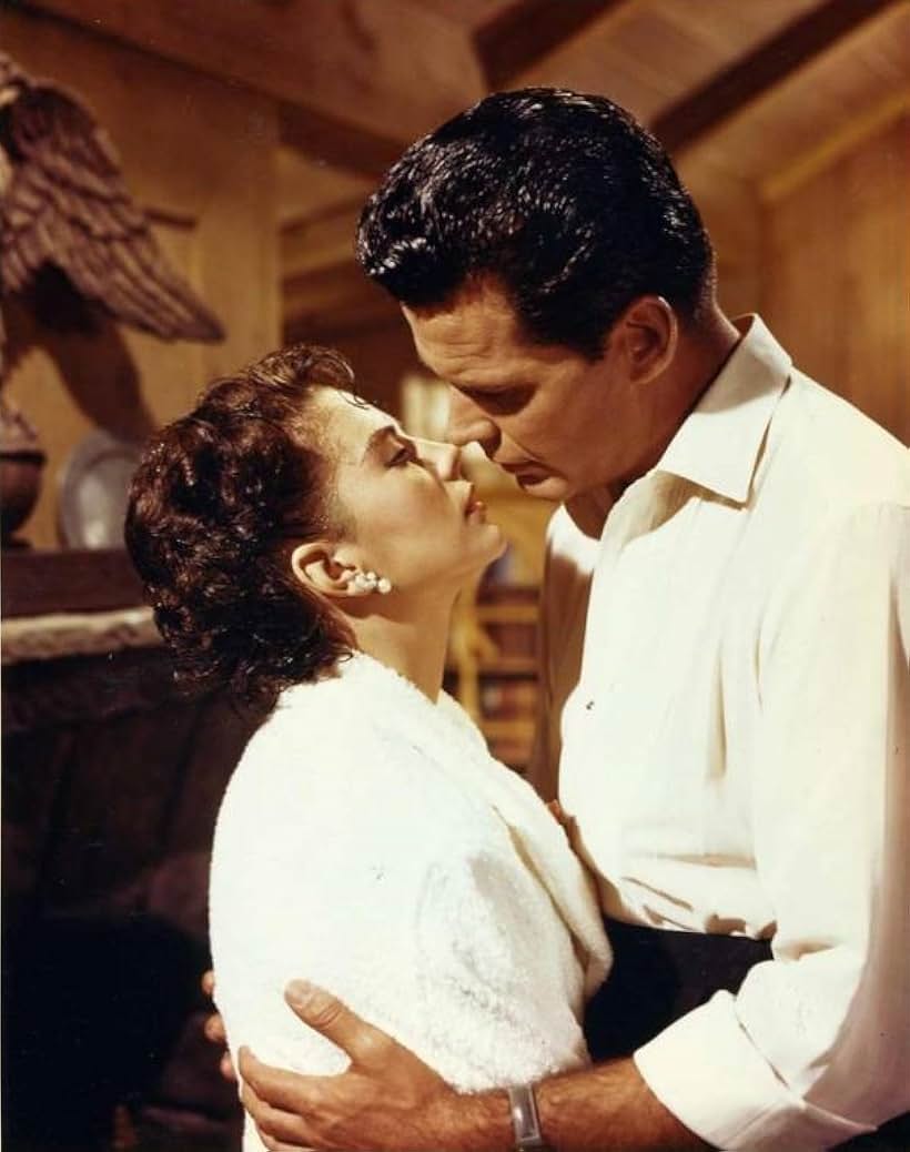 Natalie Wood and James Garner in Cash McCall (1960)