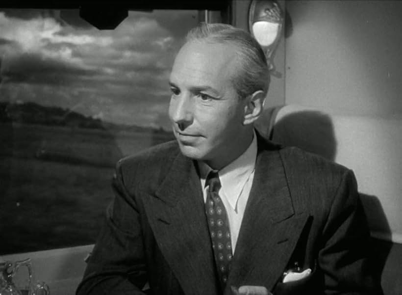 Lloyd Nolan in Two Smart People (1946)