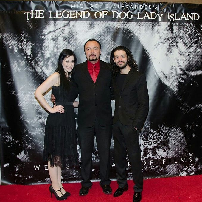 Kara Joy Reed with Michael J Alexander and Dennis Marin at the red carpet screening of The Legend of Dog Lady Island.  December 3, 2017