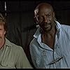 Louis Gossett Jr. and Chuck Norris in Firewalker (1986)