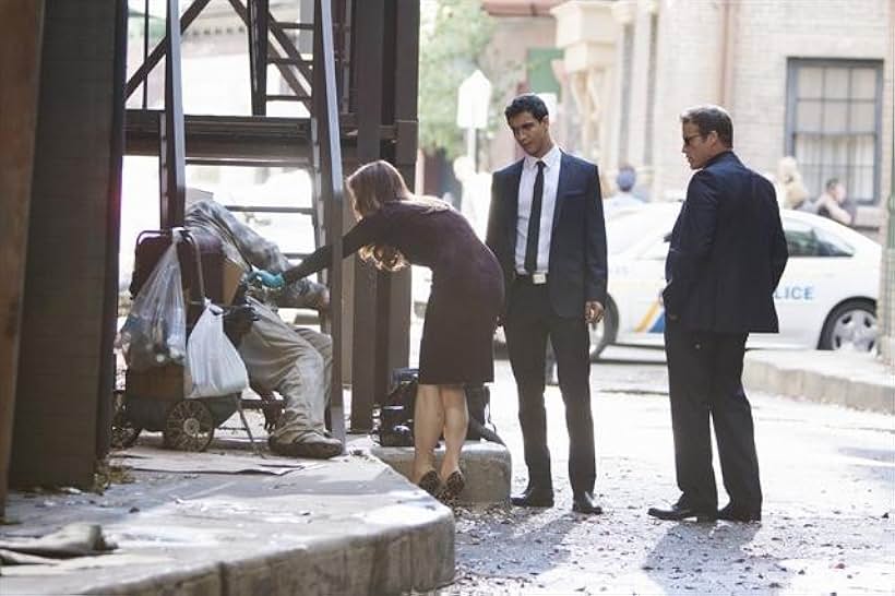 Dana Delany, Mark Valley, and Elyes Gabel in Body of Proof (2011)