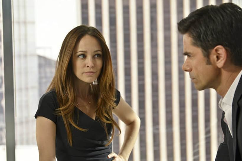 John Stamos and Autumn Reeser in Necessary Roughness (2011)