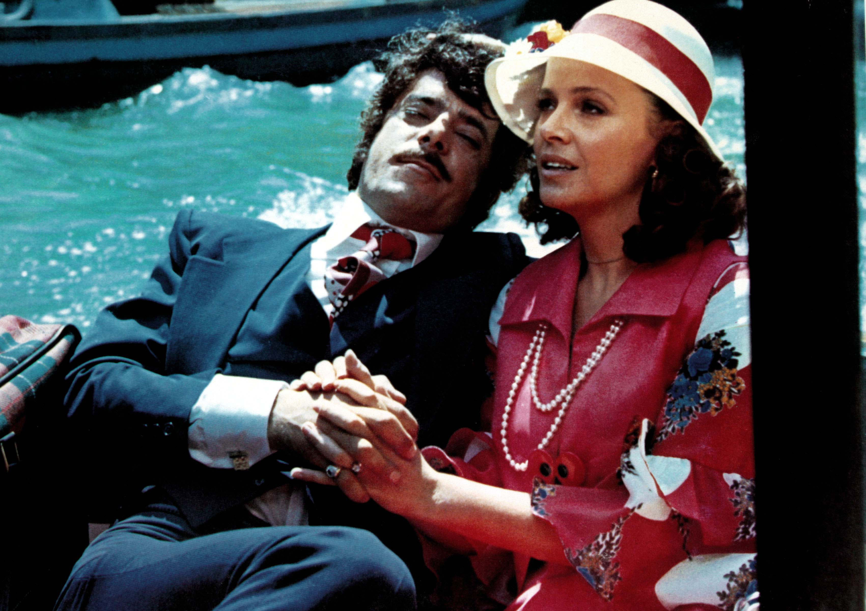 Laura Antonelli and Giancarlo Giannini in How Funny Can Sex Be? (1973)